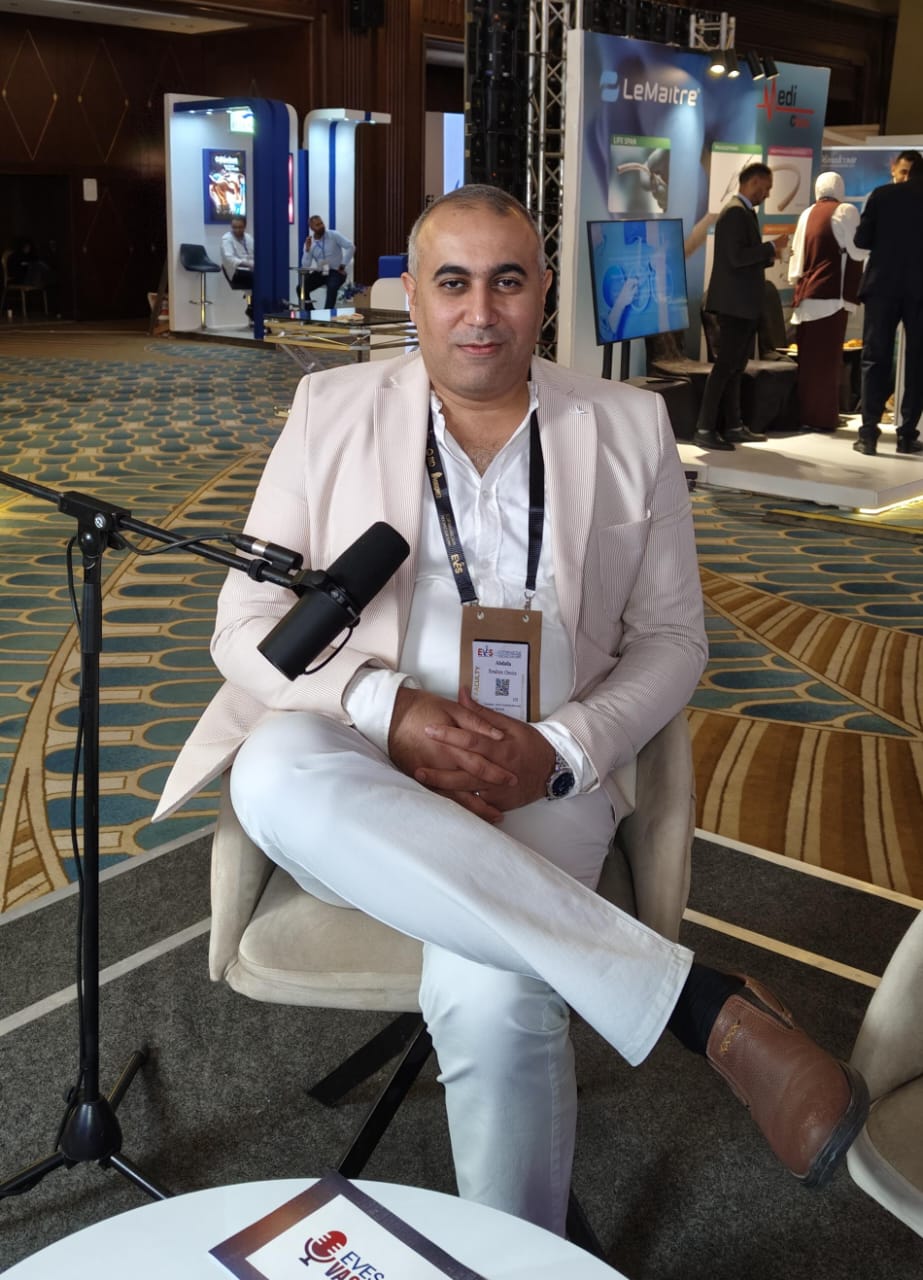 Dr. Abdalla Omira during a scientific media interview at a vascular meeting